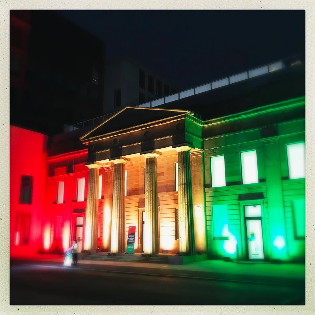 The Arts and Humanities Building lit for the celebrations of the Fifth Pan African Congress in Manchester (image: Michael Gorman, Senior Learning & Teaching Fellow at Manchester Metropolitan University)