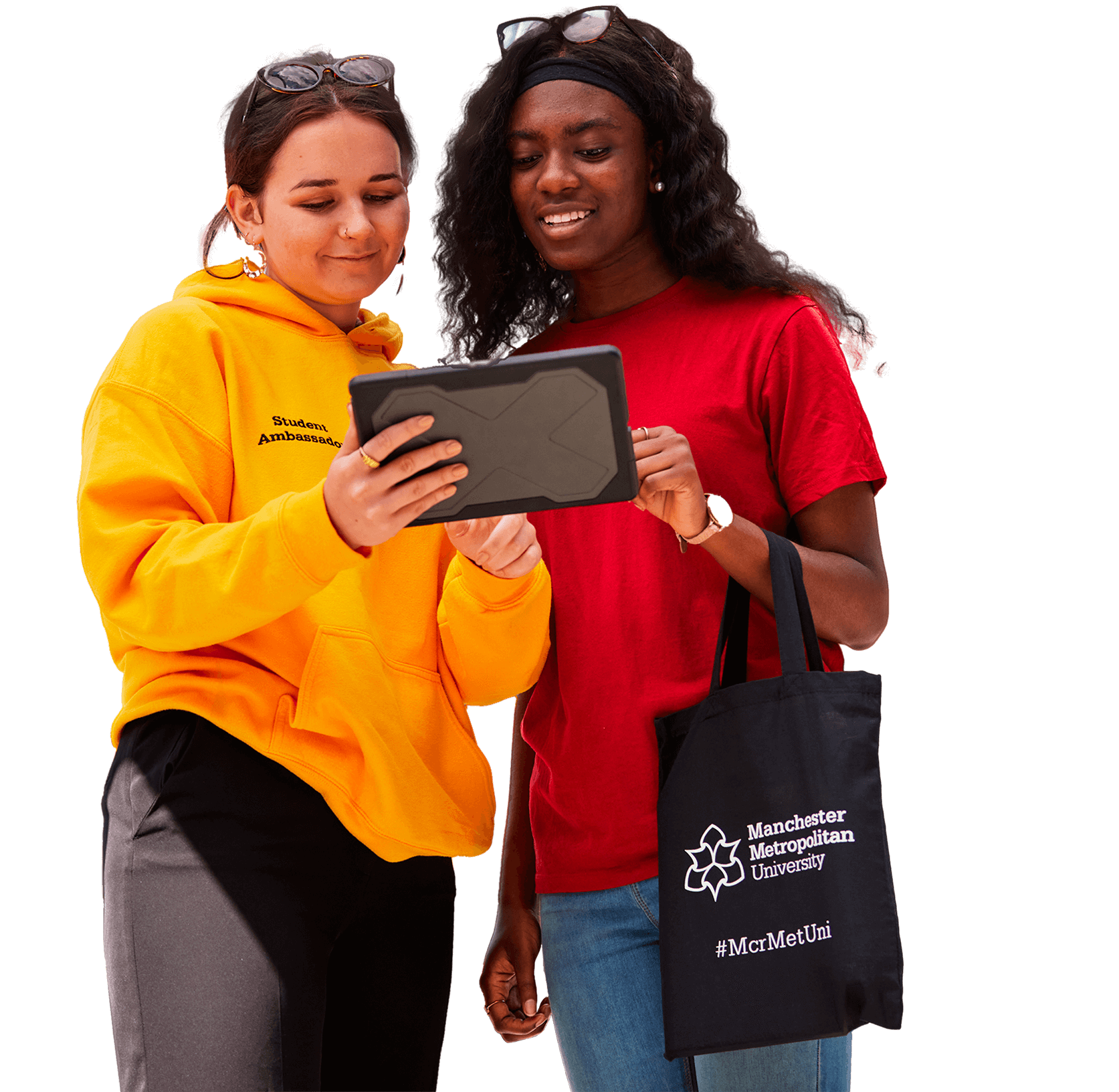 A student and prospective student talking while looking on a tablet