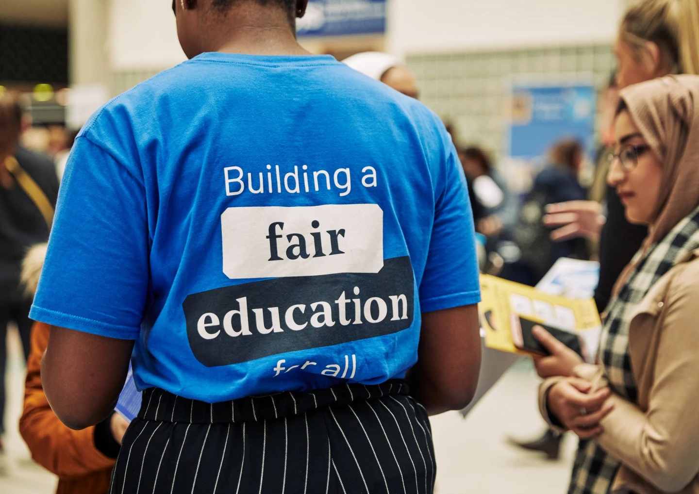 Person wearing a fair education shirt