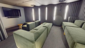 A cinema room at Lambert and Fairfield House