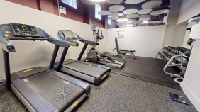 Gym space with treadmills at Lambert and Fairfield House